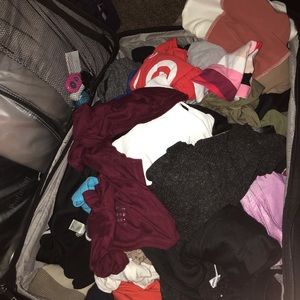 Suitcase fill of clothes
